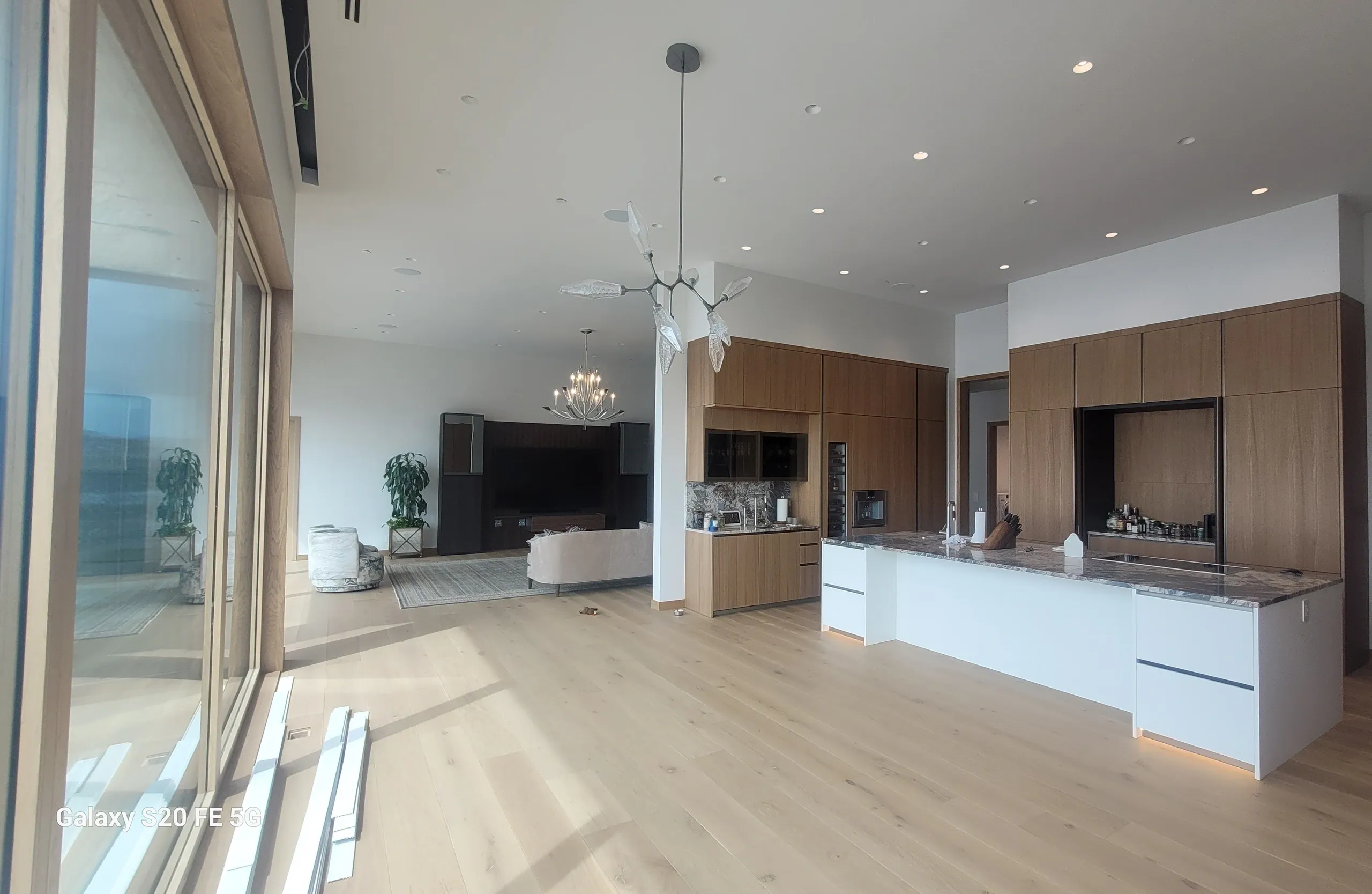Spacious modern kitchen with wooden accents.