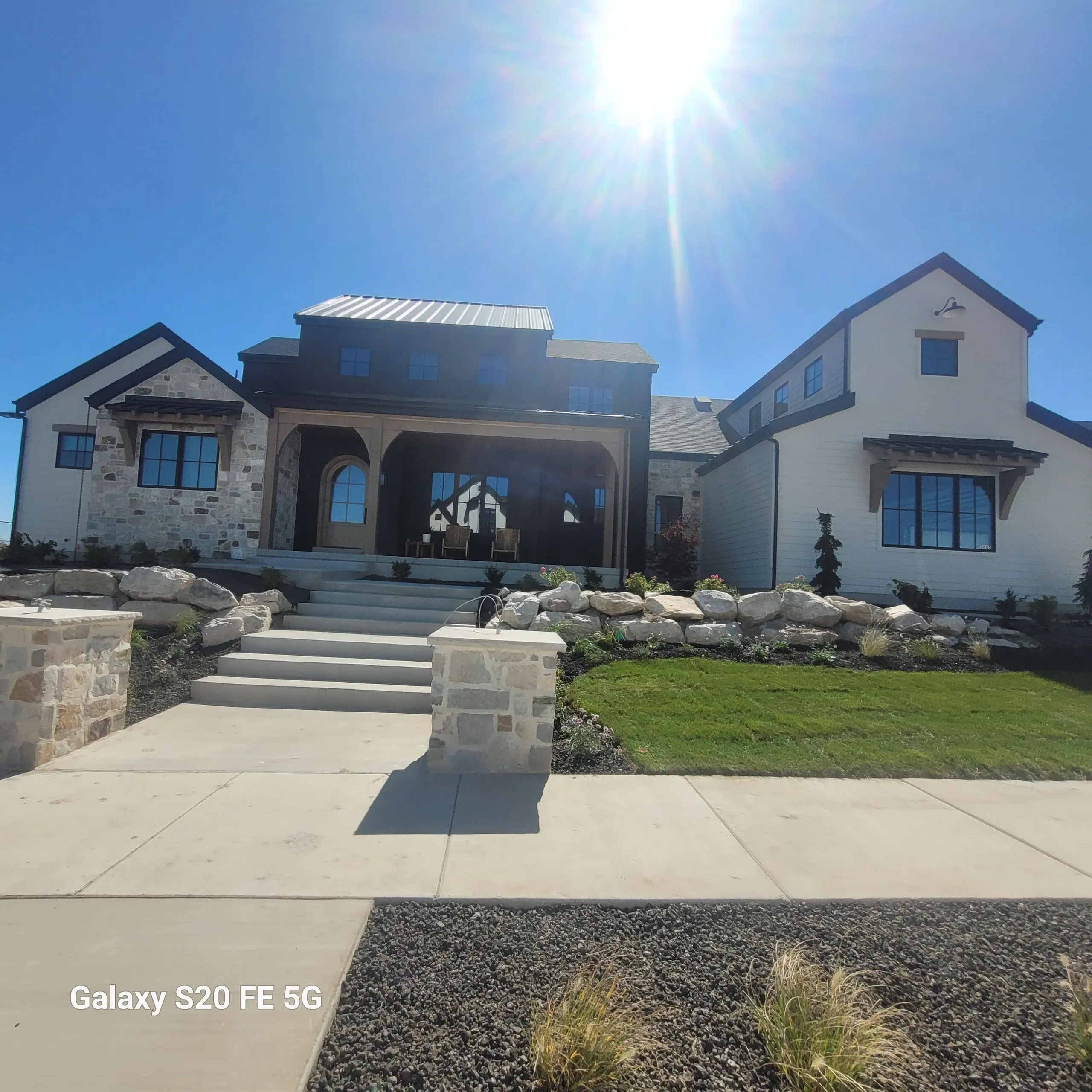 Modern house under bright sunny sky.